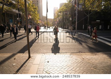 Sydney People In City Crossed Street During After Working Hour In Business Area, Martin Palce, Austr