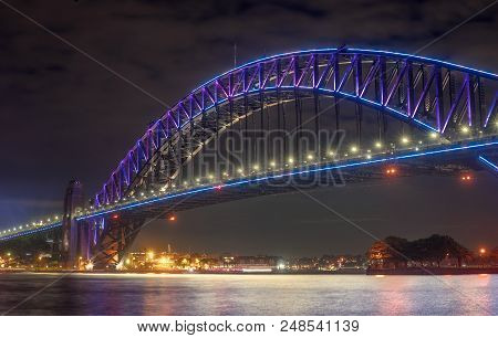 Close Up Harbour Bridge Sydney Highly Illuminated With Pink Lights View From Milson Point During Ann