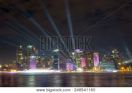 Sydney City Light Night View From Milson Points Reflecting On Still Harbour During Annual Vivid Ligh
