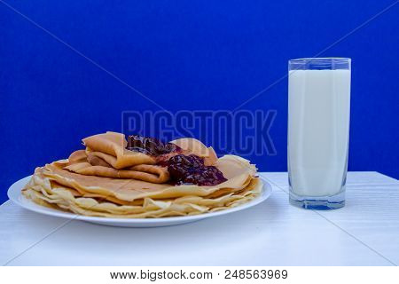Russian Blini Pancakes , Apple Jam And Condensed Milk. Celebration Of Maslenitsa. Maslenitsa Is An E