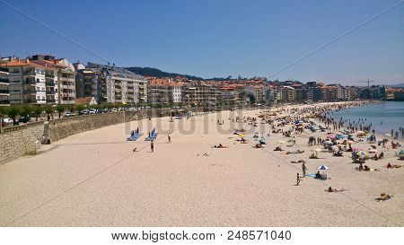 People At Urban Beach Of Silgar In Sanxenxo In Pontevedra Spain