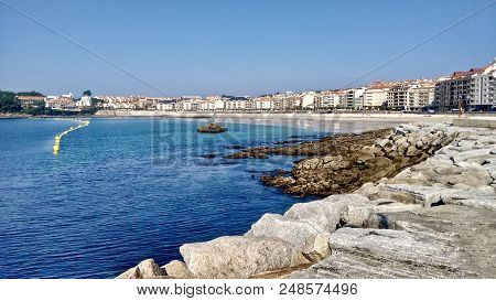 View Of The Urban Beach Of Silgar Featuring The Madama Of Silgar In Sanxenxo Spain