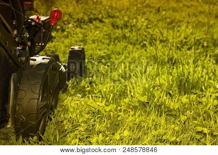 Detail Of The Wheels Of A Mechanical Traction Mower.