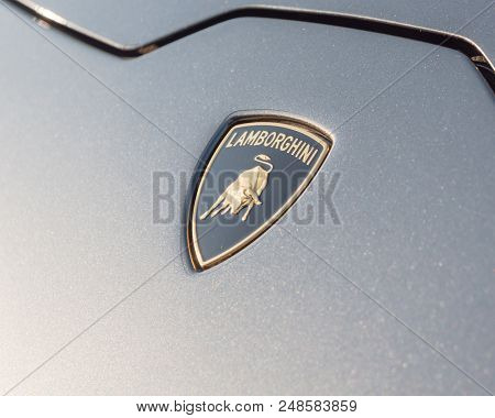 Close-up Lamborghini Logo On Grey Aventador