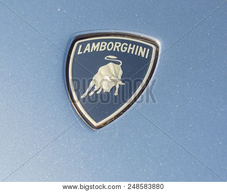 Close-up Lamborghini Logo On Grey Aventador