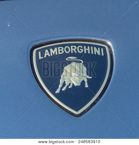 Close-up Lamborghini Logo On Grey Aventador