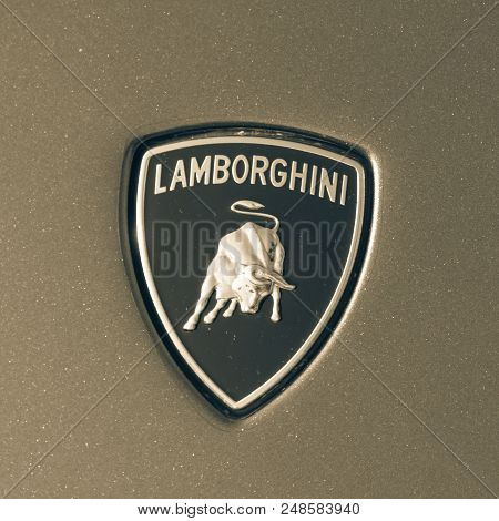 Vintage Tone Lamborghini Logo On Grey Aventador