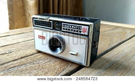 Bangkok, Thailand - March 20, 2017 : Kodak Instamatic 104 Camera On A Wood Table