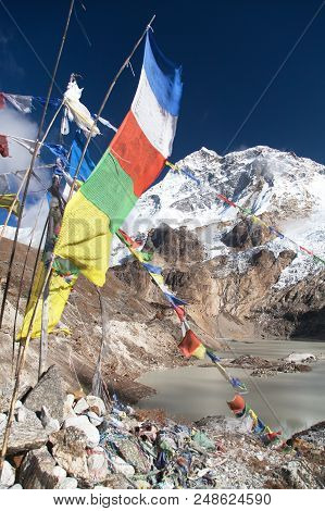 Mount Makalu With Lake And Buddhist Prayer Flags, Maklu Barun National Park, Nepal Himalayas Mountai