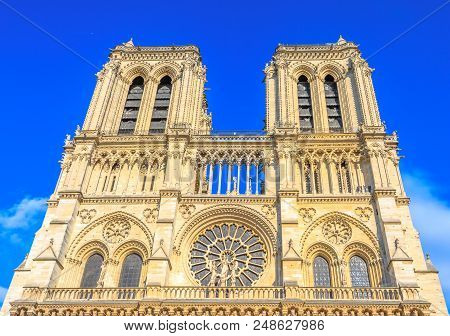 Details Of French Architecture Of Notre Dame Cathedral Of Paris, France. Beautiful Sunny Day In The 