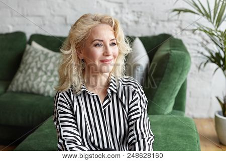 People, Rest, Leisure, Lifestyle And Relaxation. Elegant Blonde Woman Pensioner With Stylish Hairdo 