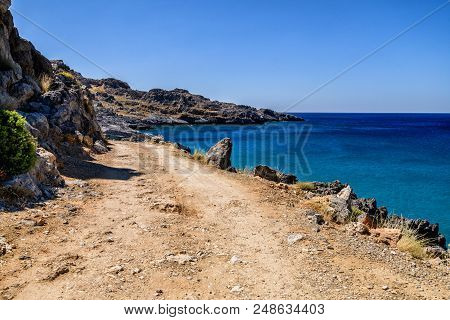 Amazing Ammoudi Beach With Turquoise Water And Beautiful View In Crete Island, Greece .