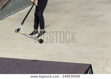 The Guy In The Jump On The Kick Scooter