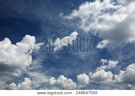 Blue Sky Background With White Clouds