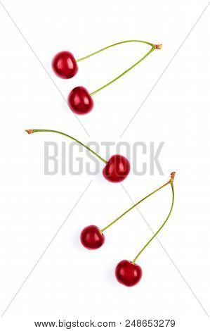 Fresh Red Cherries Isolated On White Background.