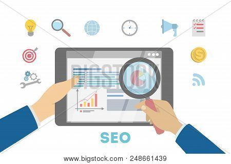 Search Engine Optimization Concept. Hand Holding Tablet And Examines Diagrams. Doing Market Research
