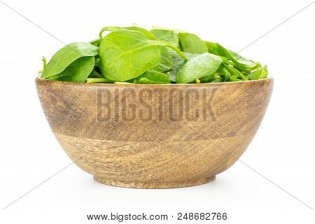 Fresh Baby Spinach Leaves In A Wooden Bowl Isolated On White Background