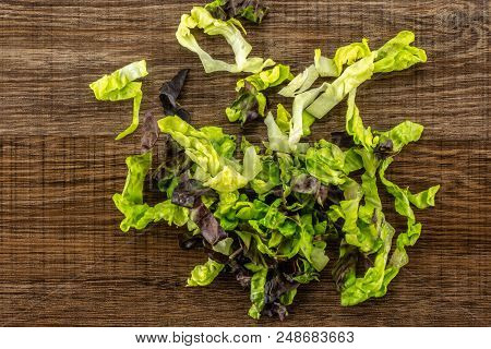Fresh Green Lettuce Red Little Gem Variety Chopped Flatlay On Brown Wood