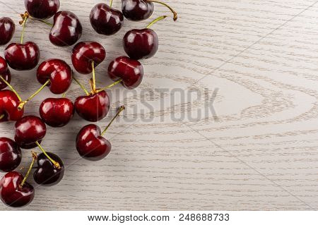 Sweet Bright Red Cherry Left Upper Corner Flatlay On Grey Wood