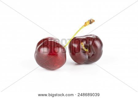 Group Of Two Whole Sweet Bright Red Cherry Isolated On White