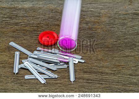 Close Up  Capillary Tube With Blood Lancet , Medical Equipment On Wooden  Background,selective Focus