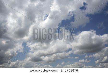 Summer sky. Blue sky and white clouds. Sky background.Sky and clouds. Skyground. Horizon. Azure. Nature background. White clouds.