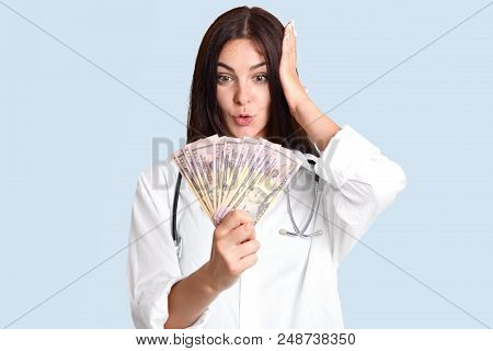 Stunned Female Physician With Dark Hair, Looks Surprisingly At Dollars, Recieves Huge Bribary, Invol