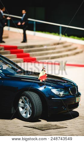 Strasbourg, France - Apr 21, 2015: Side View Of Luxury Bmw Limousine With Royal Belgium Flag Parked 