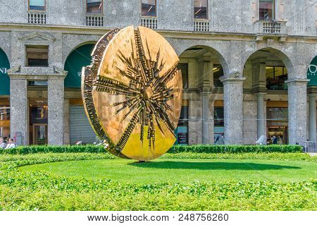 Milan, Italy - May 29, 2018: Disco Di Arnaldo Pomodoro Art In Sunny Day.