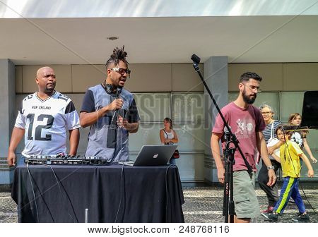Sao Paulo, Brazil - July 8, 2018: An Unidentified Group Of People And A Dj At Paulista Avenue Playin