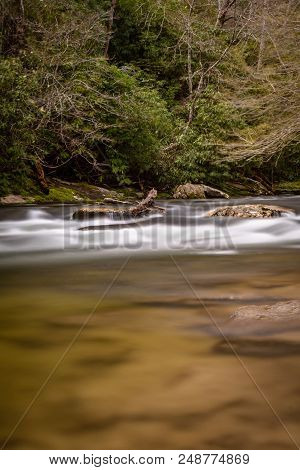 Water Rushes Past Rocks In Spring Creek In Smokies