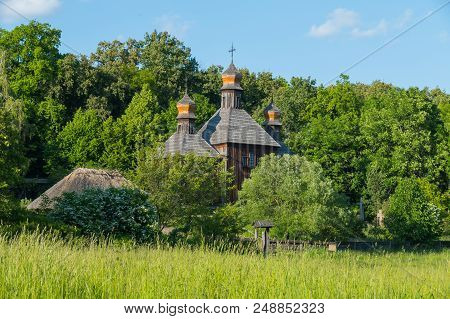 Memorial Of Folk Wooden Architecture Church With Domes In The Museum. Uzhhorod Ukraine