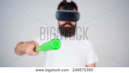 Man With Beard In Vr Glasses Holds Baseball Bat, Grey Background. Vr Sportsman Concept. Hipster On C