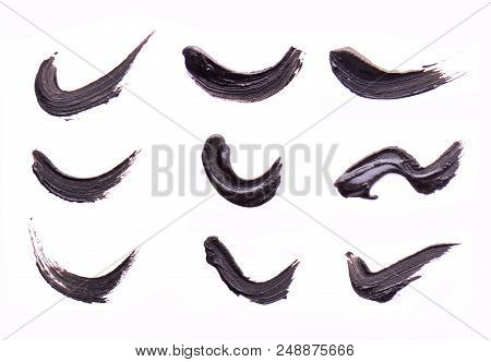 Set Of Black Strokes Of Mascara On A White Background. Texture Of Black Mascara For Eyelashes Isolat