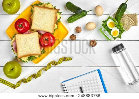 Top View Planning Notebook With Copy Space And Healthy Breakfast. Sandwich With Ham And Cheese, Eggs