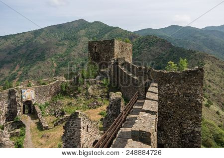 Maglic, Serbia - May 5, 2018: On The Wall Of Medieval Fortress Maglic, Mountain Range At Background 