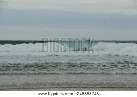 Baie Des Trepasses Beach In Cleden Cap Sizun And Sailboat