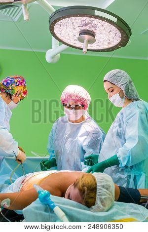 Cosmetic Liposuction Surgery In Actual Operating Room