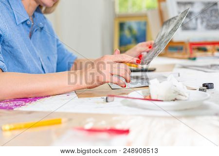 Woman Drawing A Picture With Pencil. Front View On Drawing Girl With Pencil In Her Hand. Young Woman