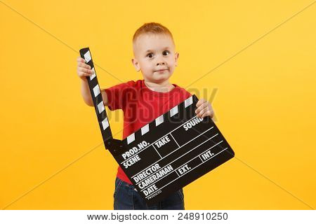 Little Cute Kid Baby Boy 3-4 Years Old In Red T-shirt Holding In Hand Classik Black Film Making Clap