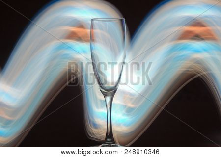 Night Photo Of Champagne Glass With Bright Lights