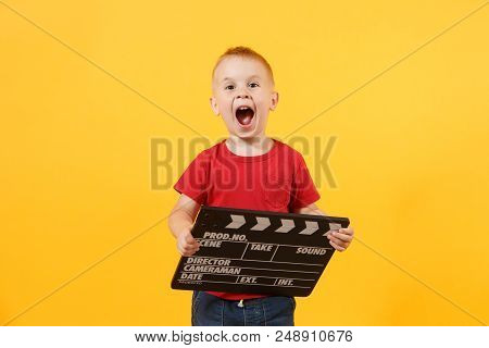 Little Cute Kid Baby Boy 3-4 Years Old In Red T-shirt Holding In Hand Classik Black Film Making Clap