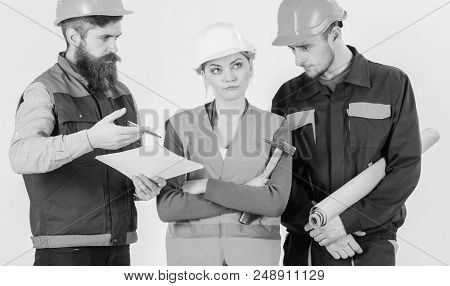 Inspector Chastises Employee, Builder. Insubordination Concept. Men And Woman In Helmets On Bored Fa