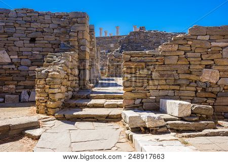 Ancient Ruins In The Island Of Delos In Cyclades, One Of The Most Important Mythological, Historical
