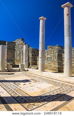 Ancient Ruins In The Island Of Delos In Cyclades, One Of The Most Important Mythological, Historical