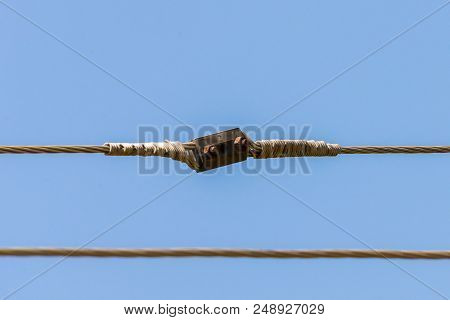 High-voltage Connector Electric Wire System. Blue Sky Background