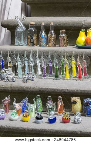 Gdansk, Poland - June 5, 2018: Mariacka Street, Souvenir Shop, Articles Made Of Colored Glass, Main 