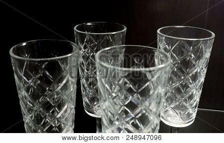 Kitchen Utensil, Collection Of Transparent Empty Vintage Crystal Glass Stemware Used To Set A Table 