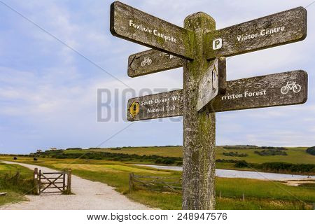 A Signpost On The South Downs Way Near Cuckmere Haven In Sussex, England. This Is In The Seven Siste