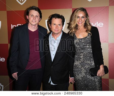 LOS ANGELES - JAN 13:  Michael J Fox, Tracy Pollan & son Sam arrives to the WB/In Style Golden Globe Party  on January 13, 2013 in Hollywood, CA                